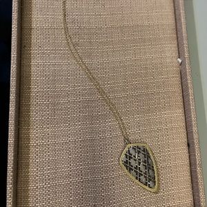 Long gold necklace